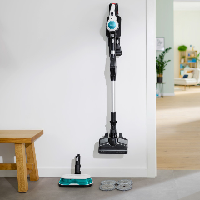 Bosch Unlimited 7 Rechargeable 2-in-1 ProHygienic Aqua Vacuum & Mop Cleaner hung on the wall