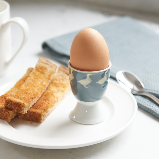 KitchenCraft Porcelain Goose Egg Cup on a plate