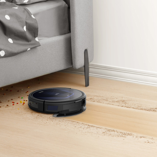Eufy G50 Hybrid Robot Vacuum Cleaner on laminated flooring in the bedroom