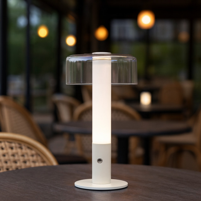 Arc & Hue Arcis Portable & Rechargeable LED Lamp - Cream on a dinner table
