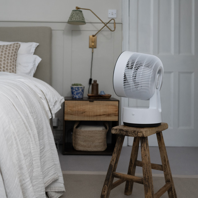Meaco Sefte Portable Rechargeable Air Circulator Desktop Fan on a stool in the bedroom