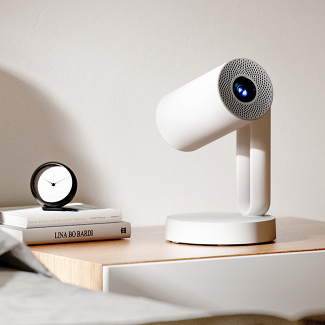 Etoe Starfish Google Certified 4K Android Smart TV Projector on a nightstand