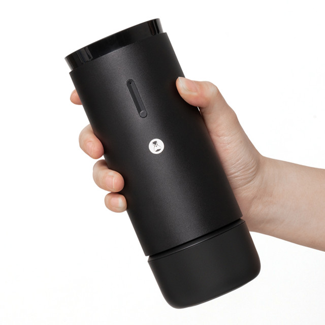 Timemore Whirly 01s Rechargeable Coffee Grinder handheld showing scale