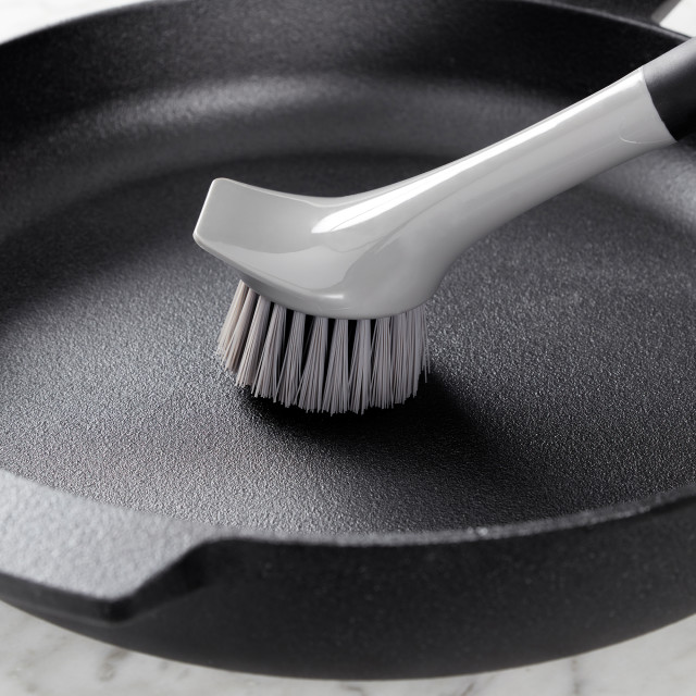 KitchenAid Cast Iron Cleaner Brush on a pan