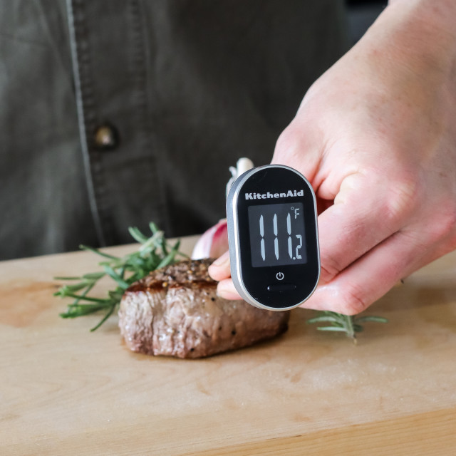 KitchenAid Instant-Read Pivoting Digital Thermometer measuring meat temperature 