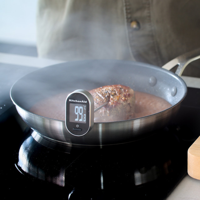 KitchenAid Instant-Read Pivoting Digital Thermometer measuring meat temperature 