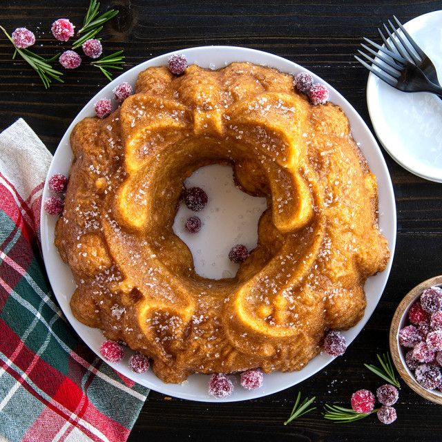 Nordic Ware Holiday Wreath Bundt Pan with baked cake on the table