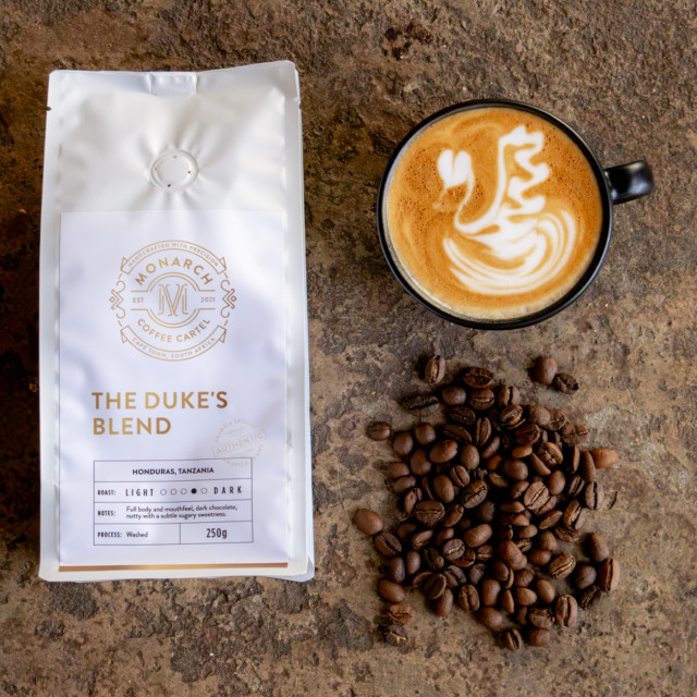 Monarch Coffee Cartel Duke's Blend Coffee Beans, 250g - Refill Bag with a cup of coffee