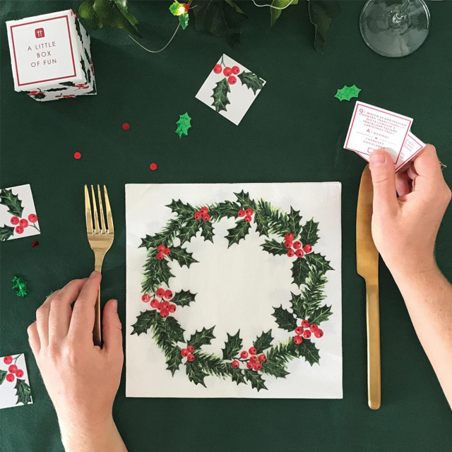 Talking Tables Botanical Christmas Trivia Game on the dinner table