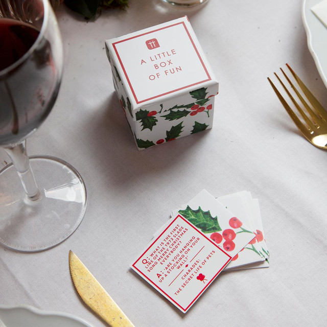 Talking Tables Botanical Christmas Trivia Game on the dinner table