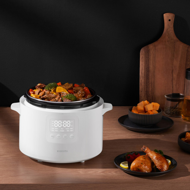 Xiaomi Smart Electric Pressure Cooker, 4.8L on the table with food