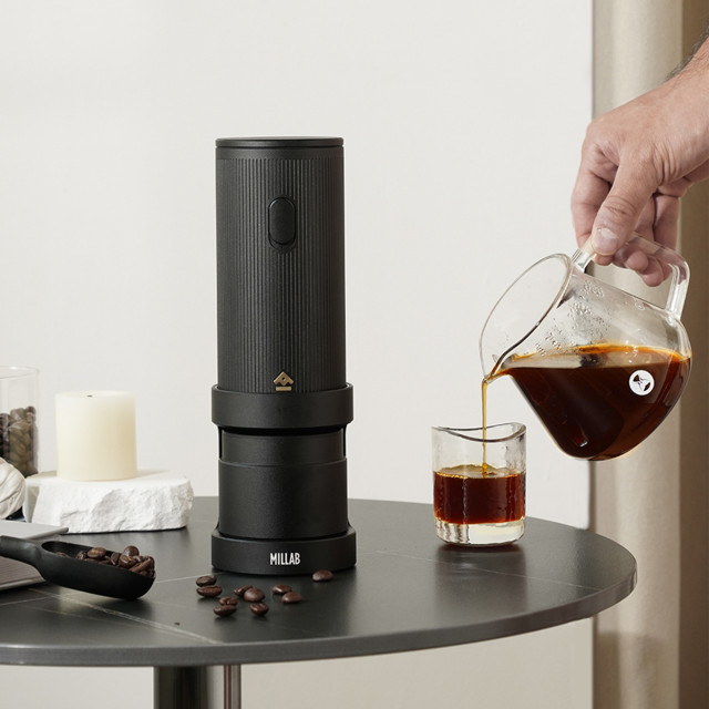 Timemore Millab E01 Portable Rechargeable Coffee Grinder on the table