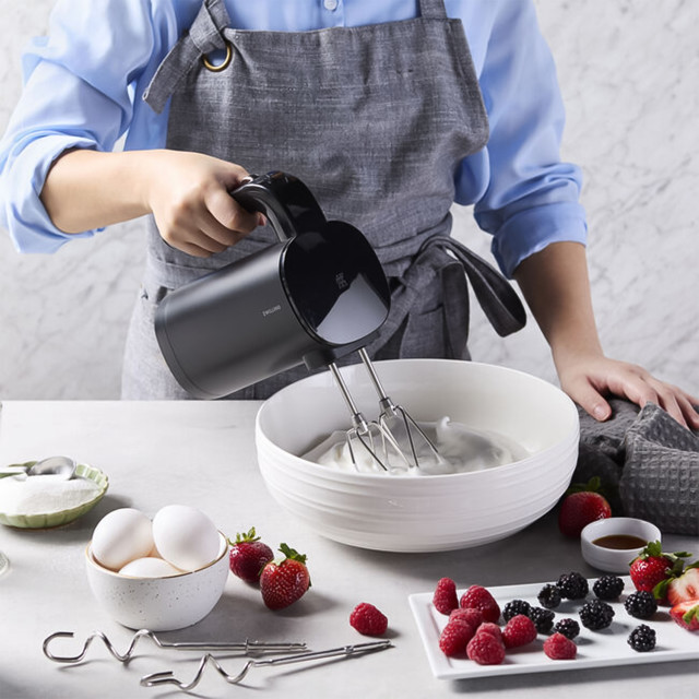 Zwilling Xtend Cordless Hand Mixer, 200W with cream in a bowl