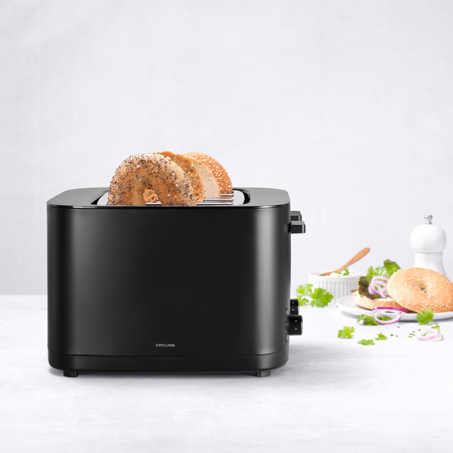 Zwilling Enfinigy 2-Slice Toaster with Bun Warmer, 1000W with bread on the kitchen counter