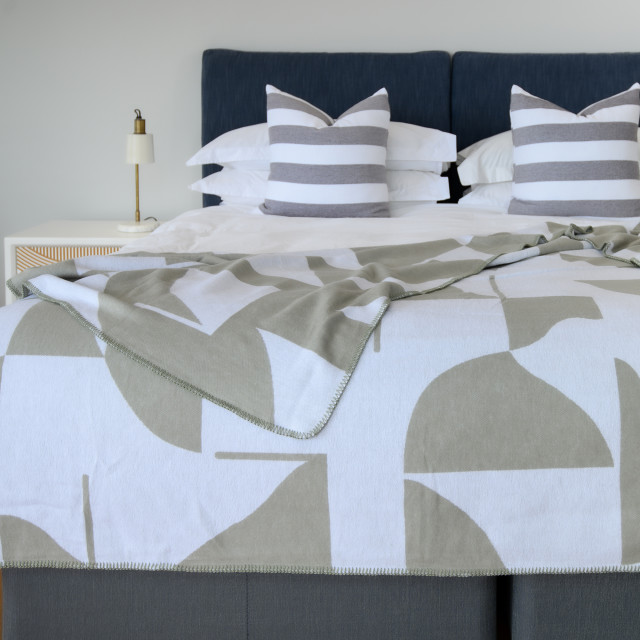 Aranda Olive White Amanda Throw, 200cm x 230cm on a bed