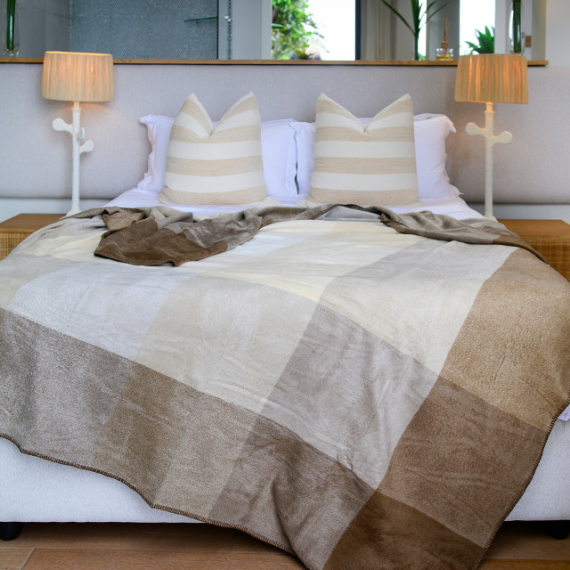 Aranda Cobblestone Coffee Top Suede Throw, 200cm x 230cm on a bed