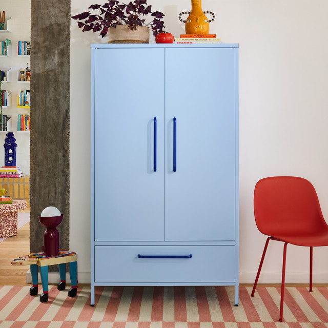Popstrukt Sprinkles Double Locker - Blueberry Splash next to a chair