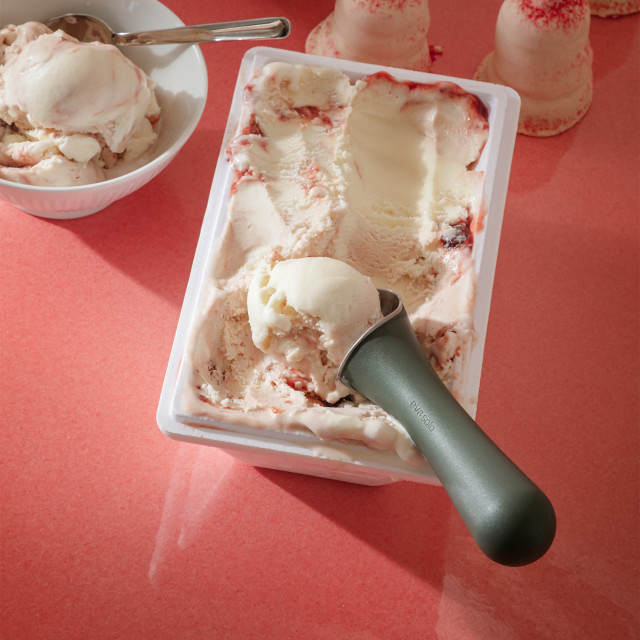 Eva Solo Green Tools Ice Cream Scoop with an ice cream tub