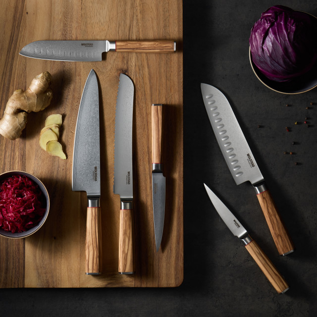 Wolstead Satoru Damascus Utility Knife, 12.5cm with other knives on chopping board