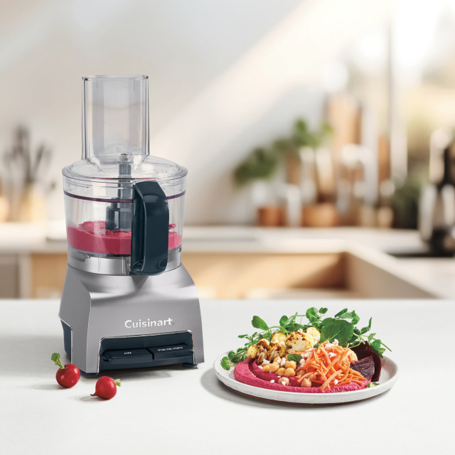 Cuisinart FlexPrep Food Processor, 1.1L on counter with a plate of food