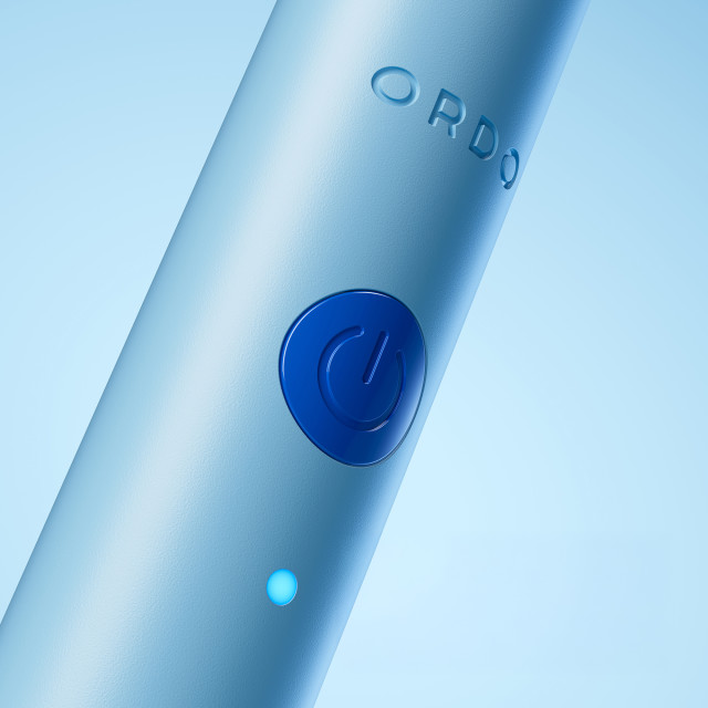 Ordo Sonic Edge Rechargeable Toothbrush - Cobalt Breeze on/off button close up