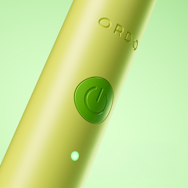 Ordo Sonic Edge Rechargeable Toothbrush - Lime Sorbet on/off button close up