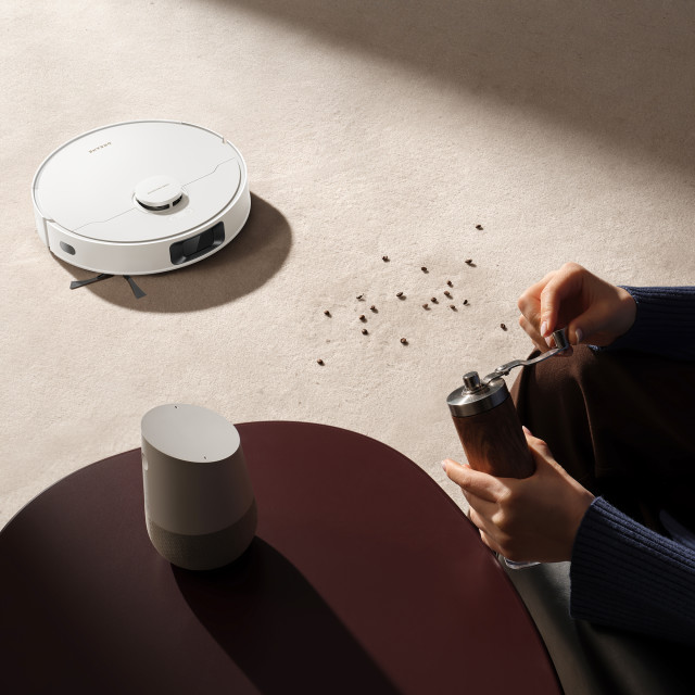 Dreame D20 Plus Robot Vacuum Cleaner picking up coffee beans