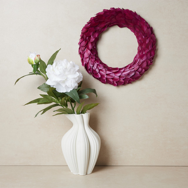 Humble & Mash Red Feather Wreath on wall