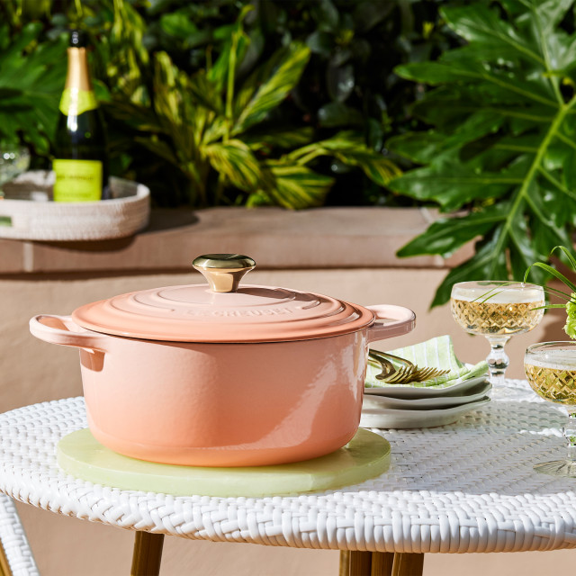 Le Creuset Peche Signature 6.3 Litre Oval Cast Iron Casserole, 31cm on the table