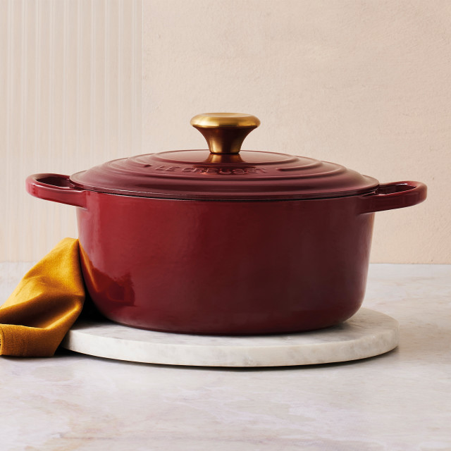 Le Creuset Signature 4.2 Litre Round Cast Iron Casserole, 24cm - Rhone on the kitchen counter