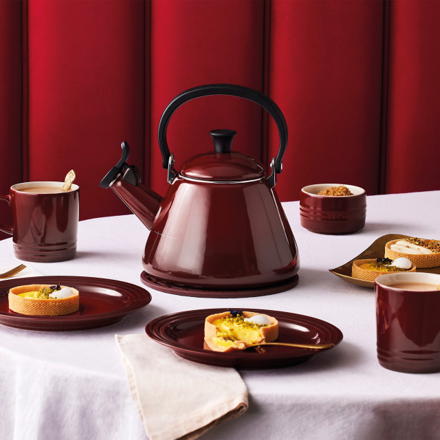 Le Creuset Kone Whistling Stovetop Kettle, 1.6L - Rhone on the table