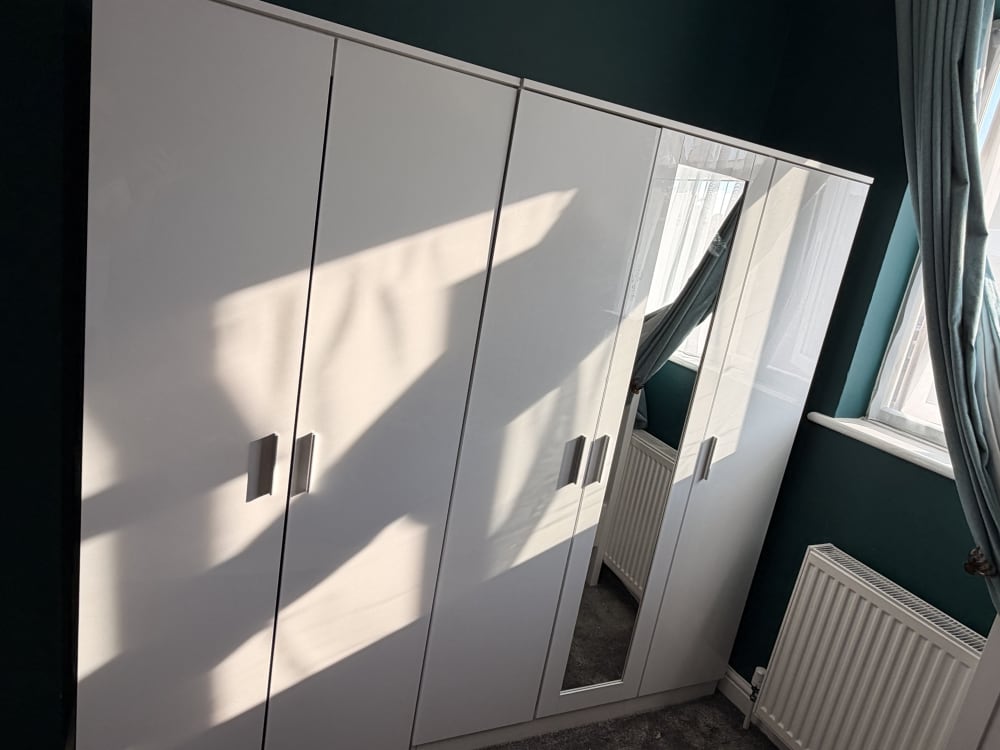 Completed white wardrobe assembly