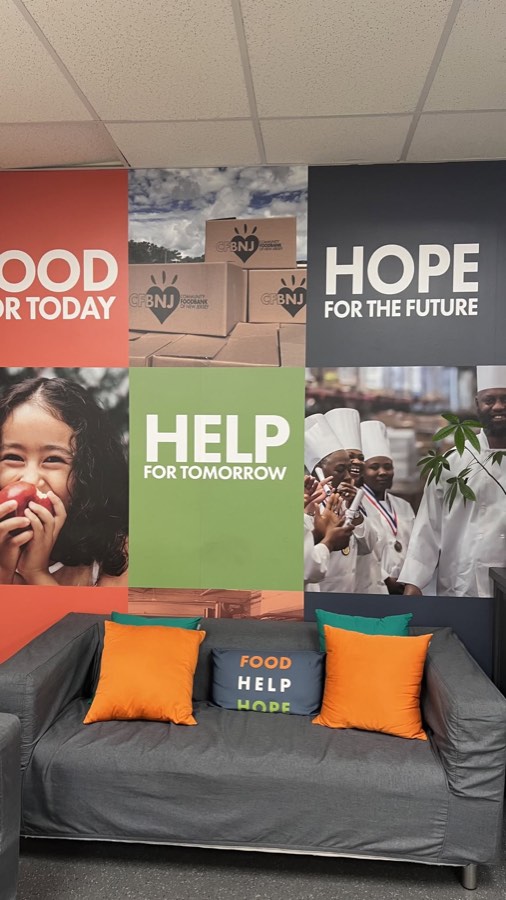 A CFBNJ lobby wall reading Food for Today, Hope for the Future, Help for Tomorrow