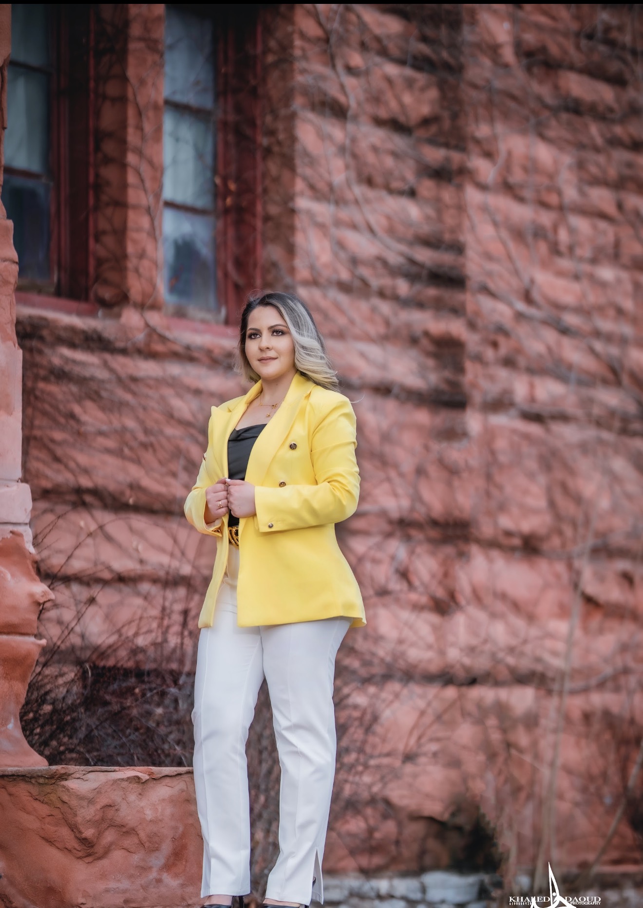 Indiana Hannosh standing in a yellow jacket