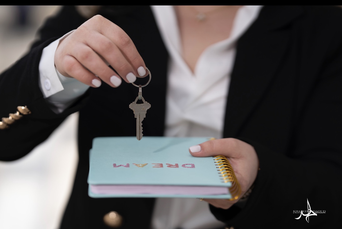 Indiana Hannosh holding a house key