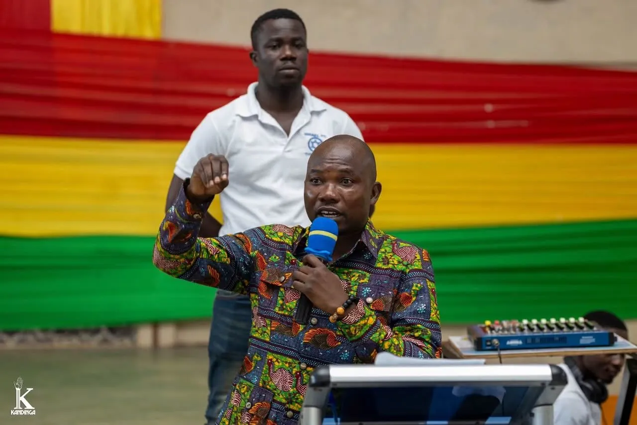 Hon. Kofi Benteh Afful engaging students during the Western North Regional SHS Cultural and Talent Tour