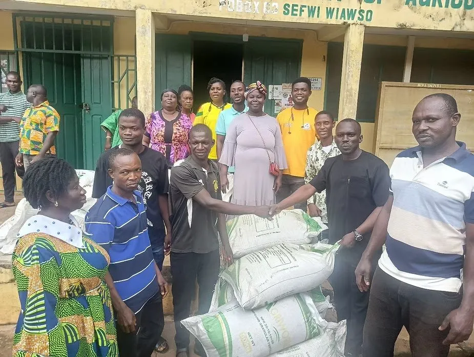 Hon. Dominic Gyasi presenting fertiliser to farmer groups in the Sefwi Wiawso Municipality
