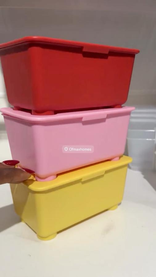 Box with lid red pink/yellow, 17x10 cm 12,500 per set These 3 colourful and stackable boxes with lids happily take care 