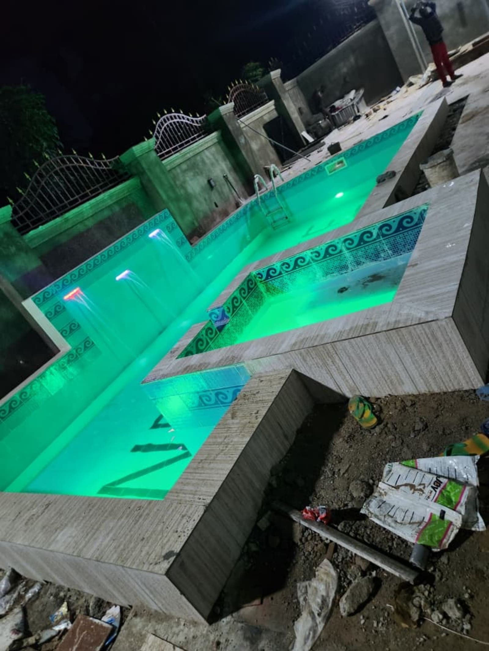 Night-Lit Terrace Pool — Swimming Pools pool project built by Metrixpool in Nigeria