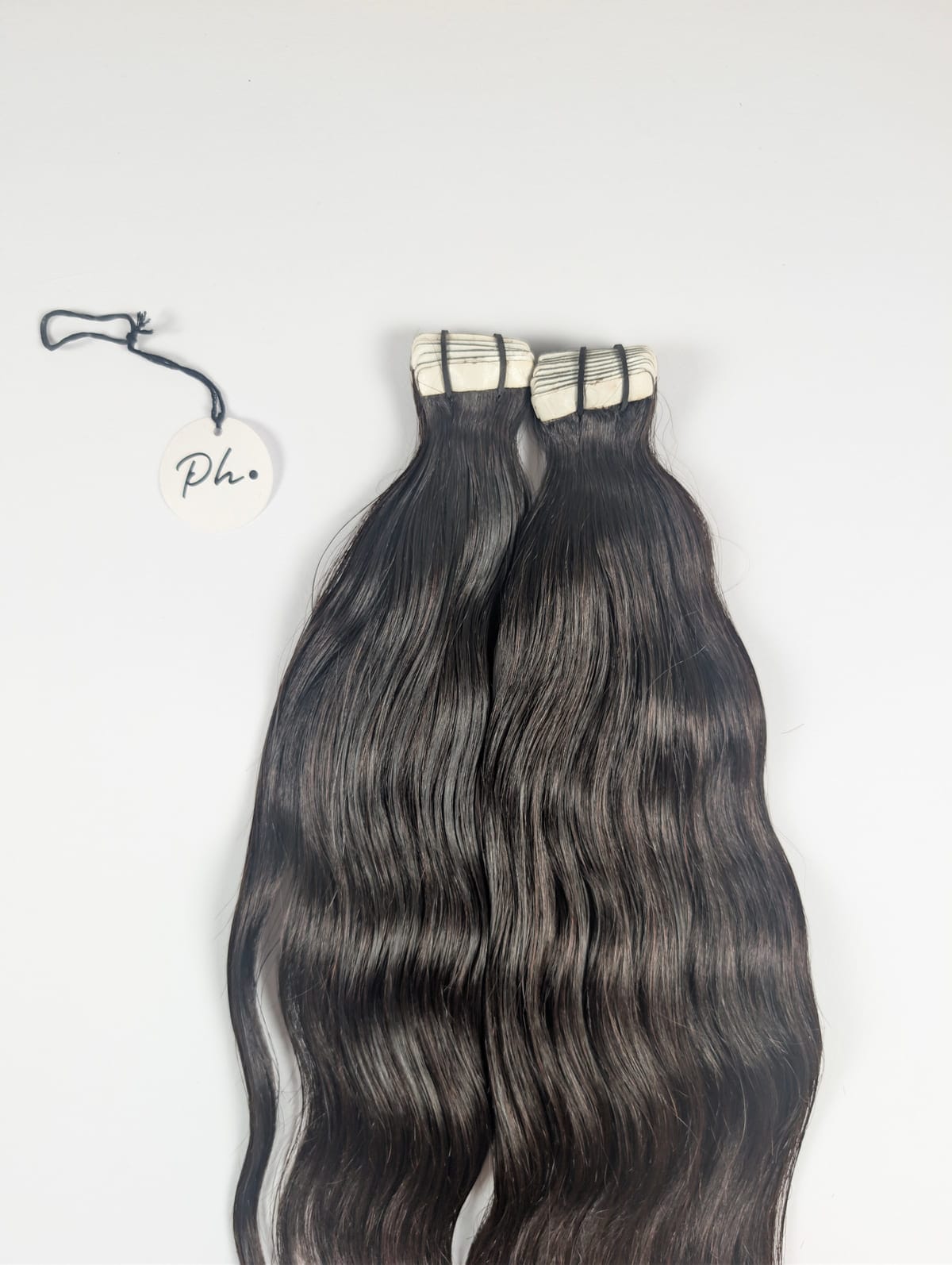 Cómo poner extensiones adhesivas tape-in paso a paso