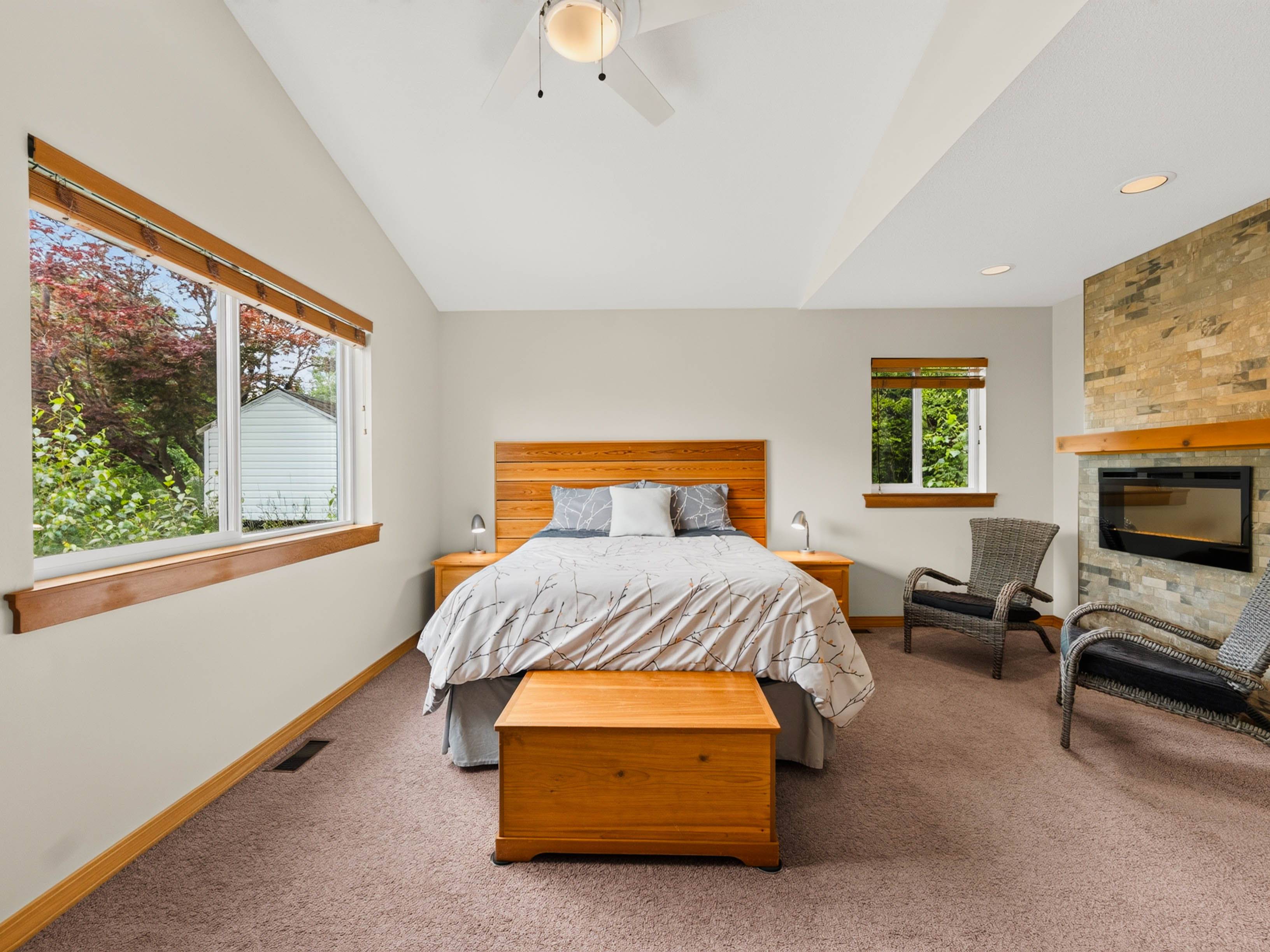 Primary bedroom suite with fireplace at 1007 Hoover Street Nelson BC