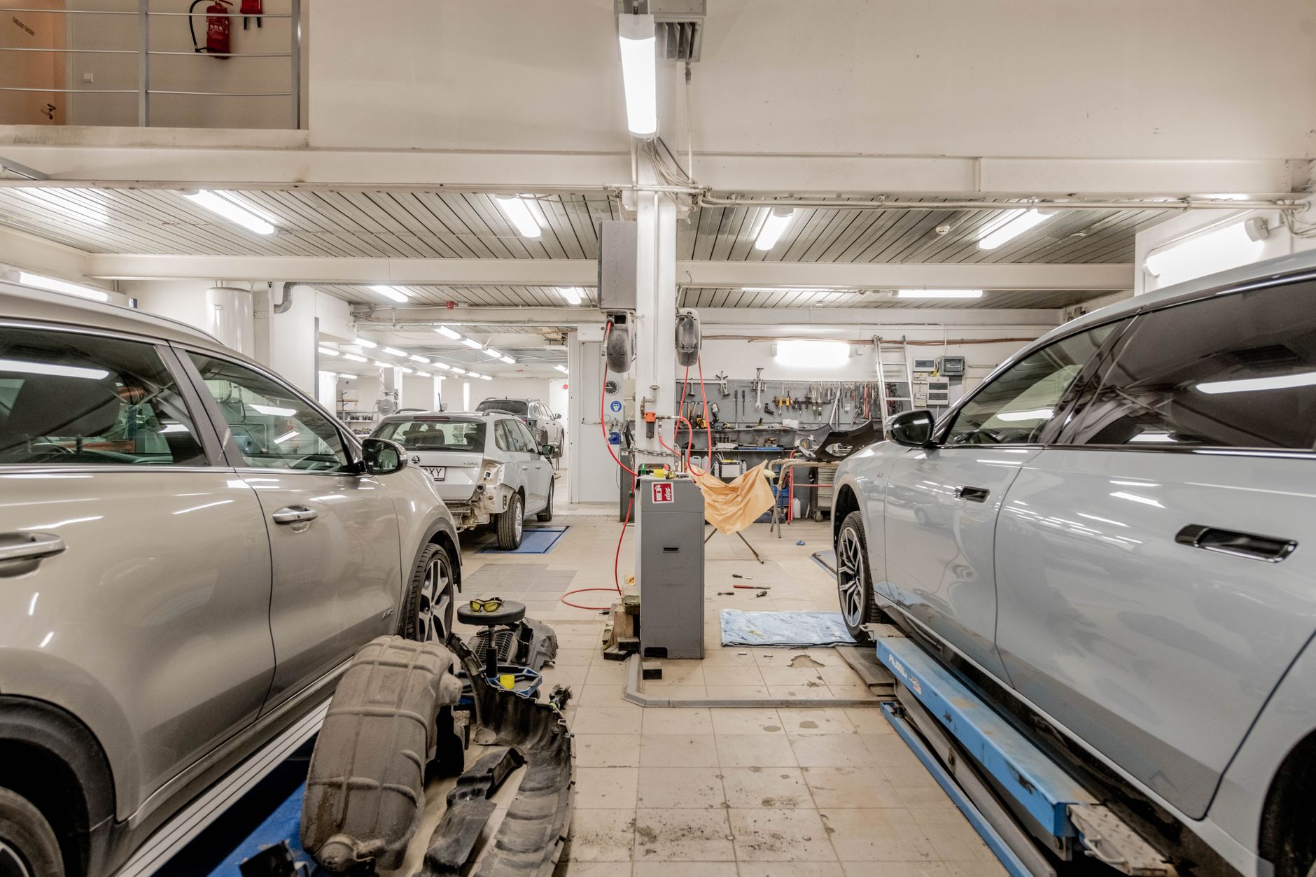 How can you do your own car servicing and general maintenance using a car repair manual?