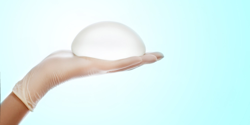 Saline Vs. Silicone Breast Implants Pros and Cons - Prejuvenation Article Banner