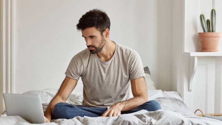 Man researching erectile dysfunction treatment on Zava's website