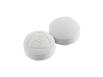 Two white priligy tablets