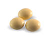 Close up of three yellow Microgynon-30 pills