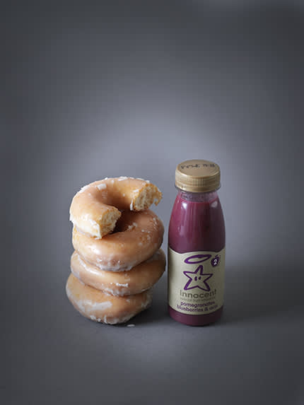 innocent smoothy next to 3 and a half doughnuts