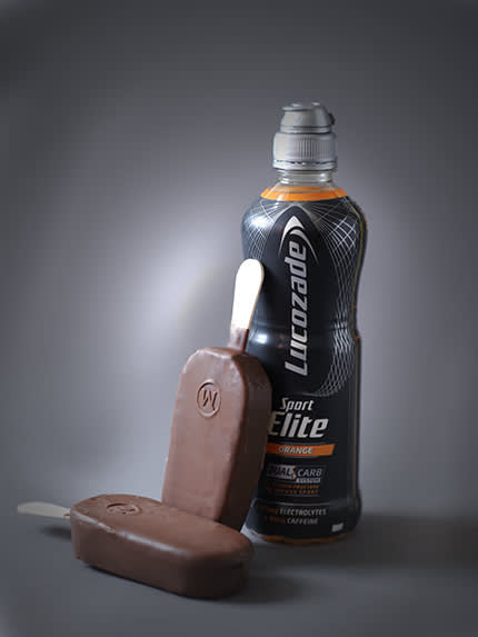 bottle of lucozade next to two magnum ice creams