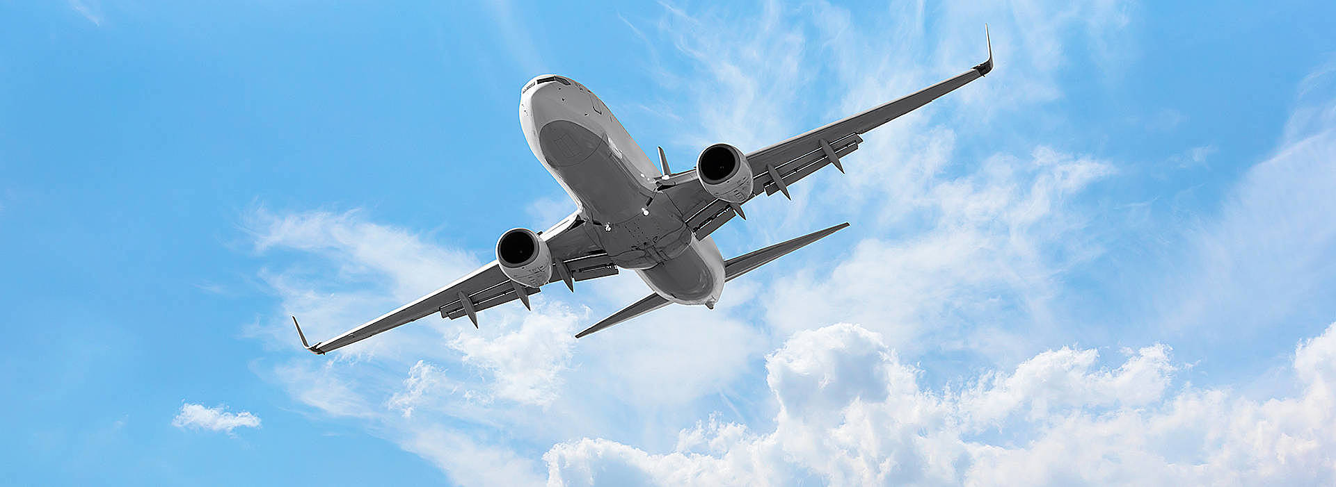 An aeroplane soaring through the skies