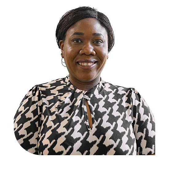 Photo of Dr Brenda Ikeji, a black woman smiling in a patterned high neck black and white top with her hair tied back.